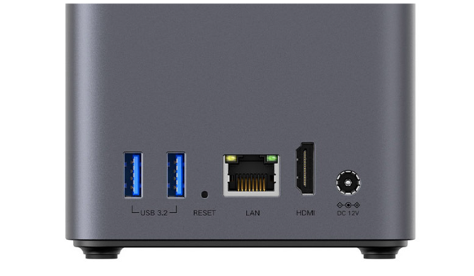 [画像：背面の端子類アップ。LANポート、USBポート、電源端子が見えるように]